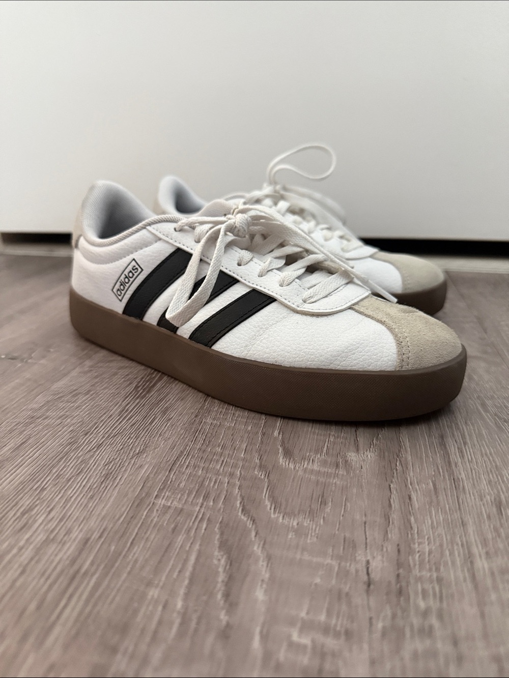 adidas White Sneakers with Black Stripes and Brown Sole